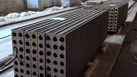 reinforced concrete slabs stacked together. plant for the creation of reinforced concrete slabs. stacks of concrete blocks. close-up.