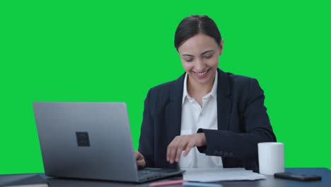 Happy-Indian-female-manager-starting-working-Green-screen