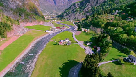 drone shot over the valley in flam, with the river flamselvi in norway