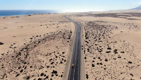 corralejo, fuerteventura: aerial view over the road that leads to the corralejo natural park