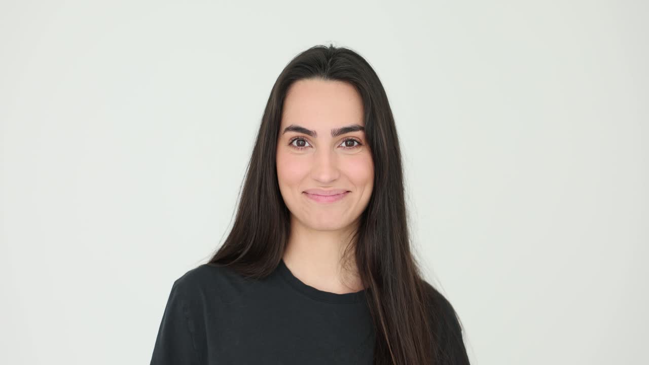 Portraits of a Smiling Brunette Woman