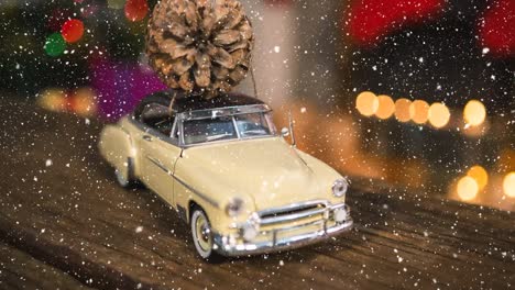 Falling-snow-with-Christmas-car-pine-cone-decoration