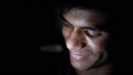 close-up portrait of a smiling young man