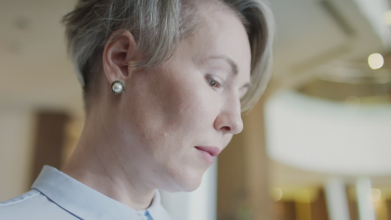 Businesswoman Messaging on Smartphone