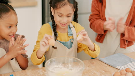 Family,-parents-and-girls-baking