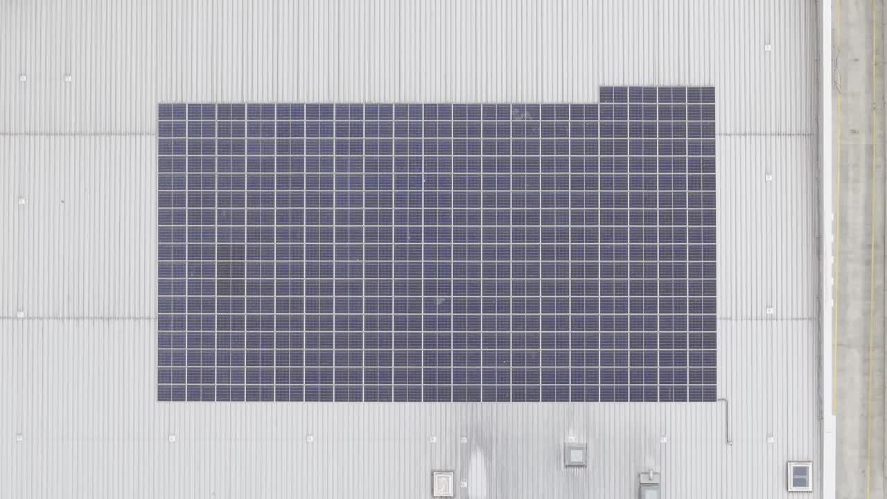 Solar panels on shopping center roof in Limerick, Ireland, clean energy from above
