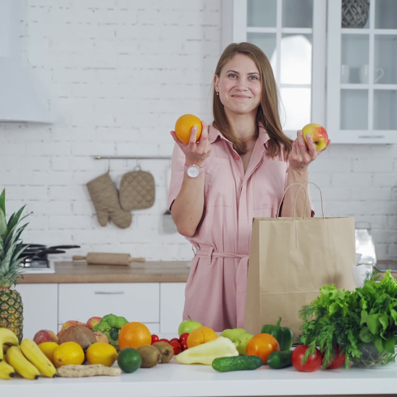Woman unpacking grocery bag
