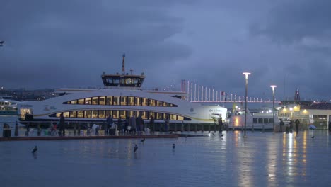 ferry at istanbul's pier at dusk