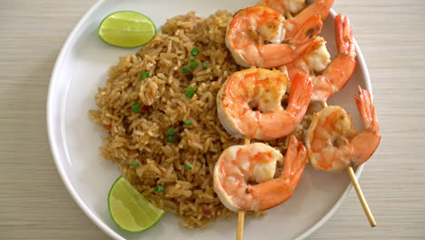 fried rice with shrimps or prawns skewers