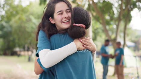 women, hugging and volunteer support in nature