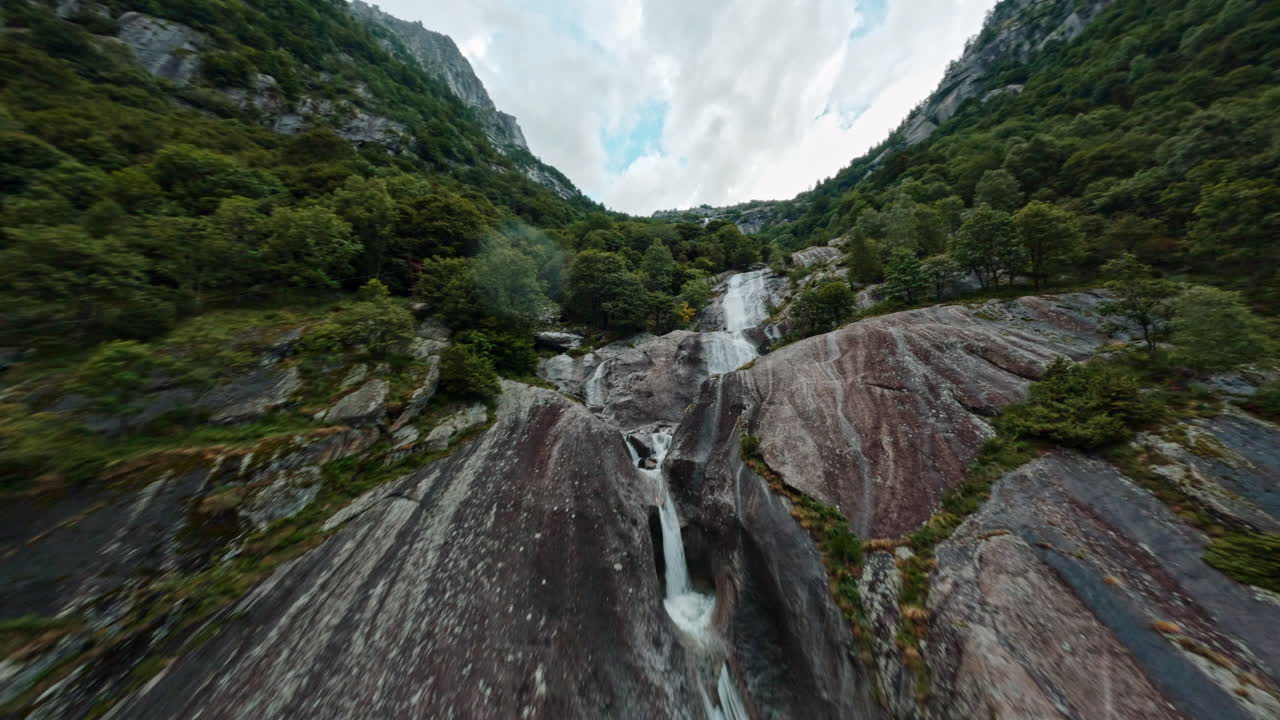 Scenic view of Cascata del Ferro waterfall in lush Italian landscape