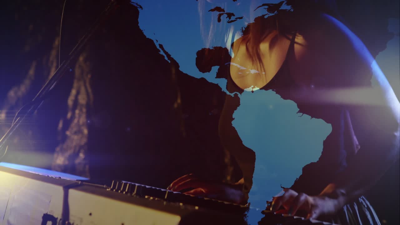 Woman musician performing keyboard leaning to mic, pressing keys initiating animated map projection