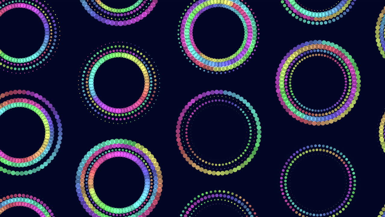 A symmetrical circular pattern of colored dots on a dark background, evenly distributed in a pleasing design. Each dot varies in color, creating a vibrant and balanced visual composition