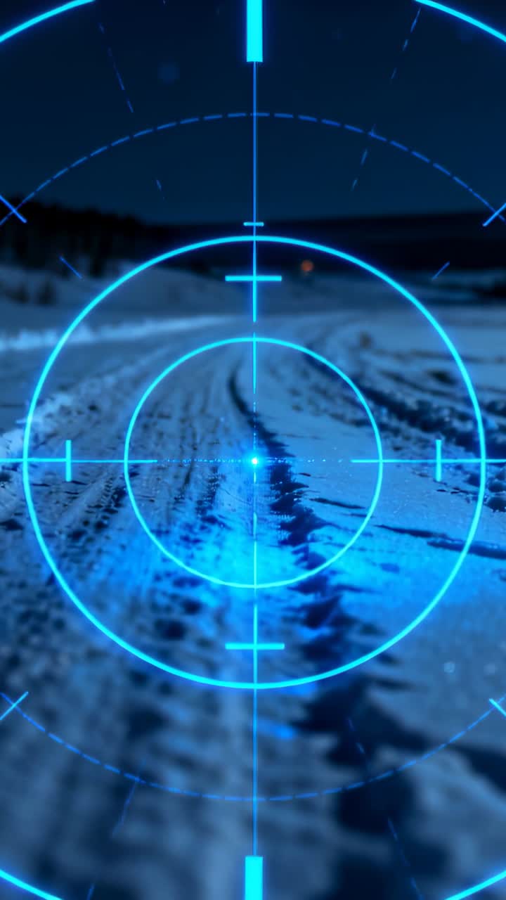 Vertical video: Pulsing blue HUD reticle locking on snow road at night, showing tracks, amber light