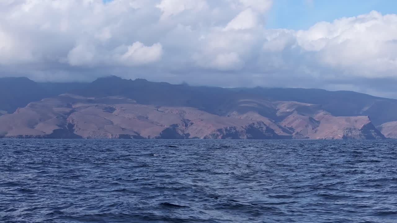 Tranquil yacht view captures vast Atlantic horizon and La Gomera coastline