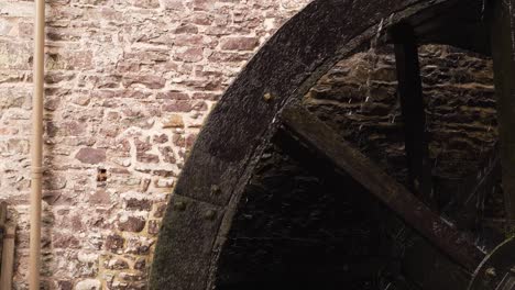 close up on a section of hydraulic wheel from a water mill