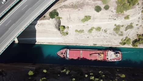 view from the top of a boat in the corinth canal between greece and peloponnese