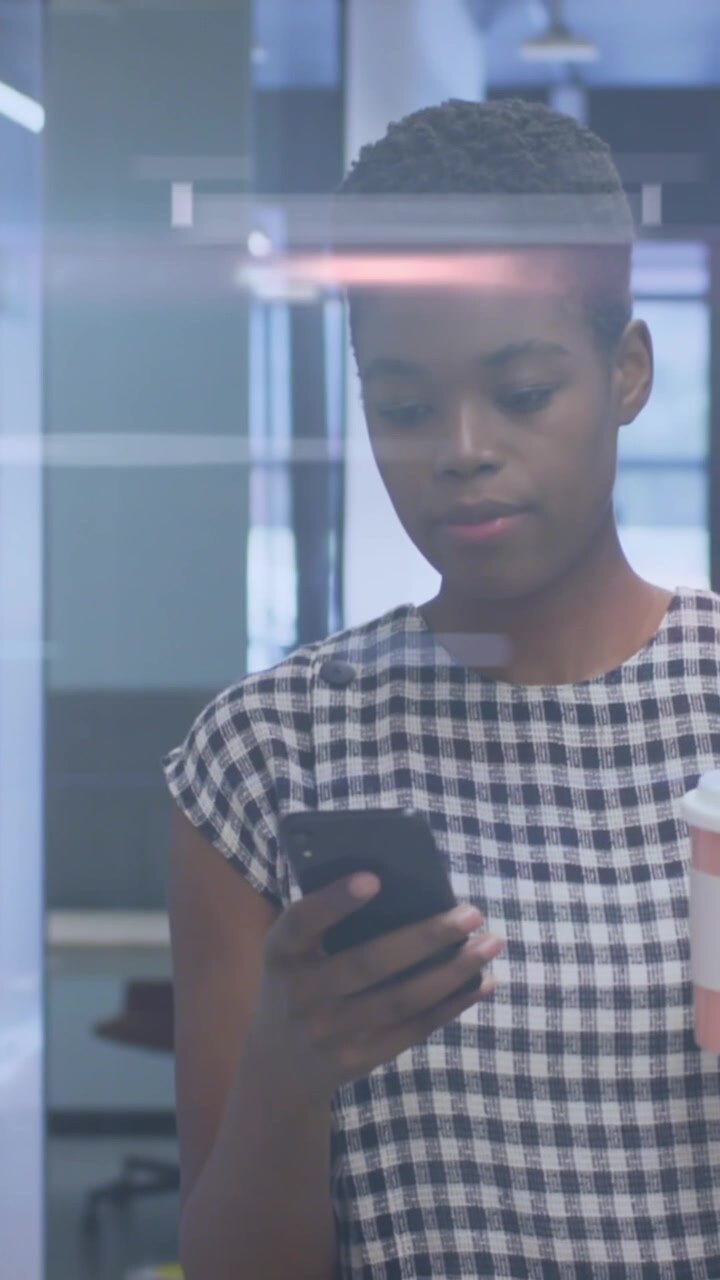 Animation of lights over african american women in server room