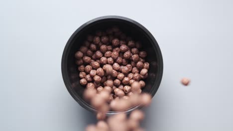 chocolate cereal in a black bowl