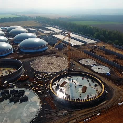station of bio gas production. modern factory. ecological production. building plant in field