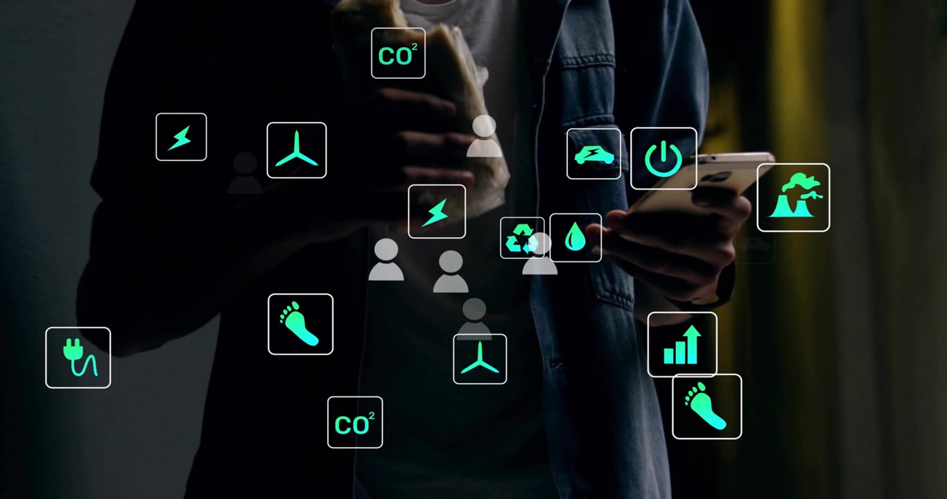 Video vertical: Hombre sosteniendo un sándwich, revisando el teléfono para métricas ecológicas y haciendo que los íconos llenen el encuadre
