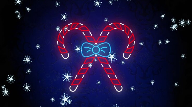 Animation of snow falling at christmas over candy canes