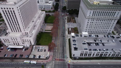 los angeles ca usa, aerial view of city hall, us courthouse, hall of justice and downtown skyscrapers, revealing drone shot by us-101 interstate route highway