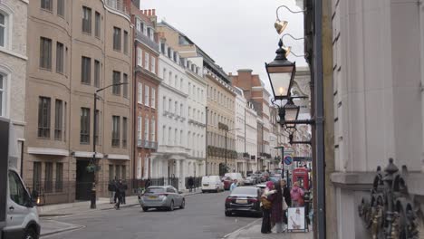 People-Walking-Past-Office-Buildings-In-Grosvenor-Street-Mayfair-London-2