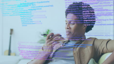 Animation-Der-Datenverarbeitung-über-Einem-Afroamerikanischen-Geschäftsmann,-Der-Auf-Dem-Smartphone-Spricht