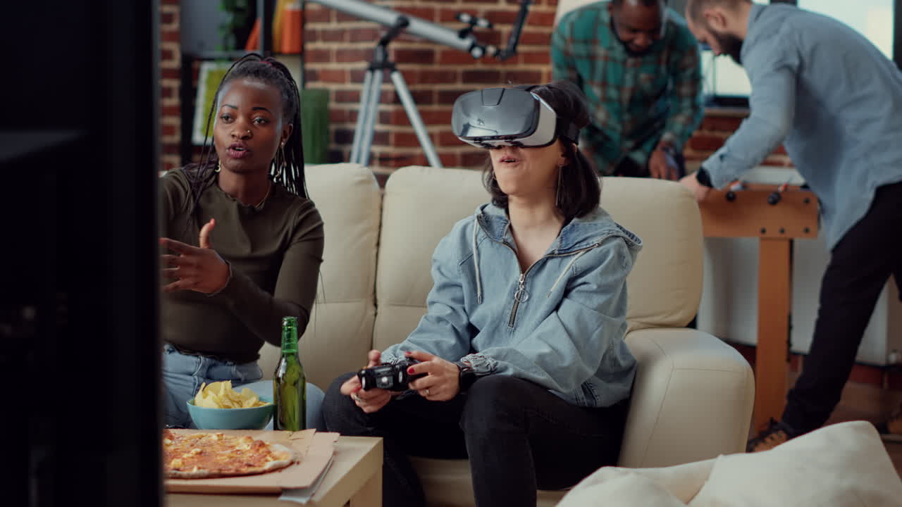 Happy women winning video games challenge with vr glasses