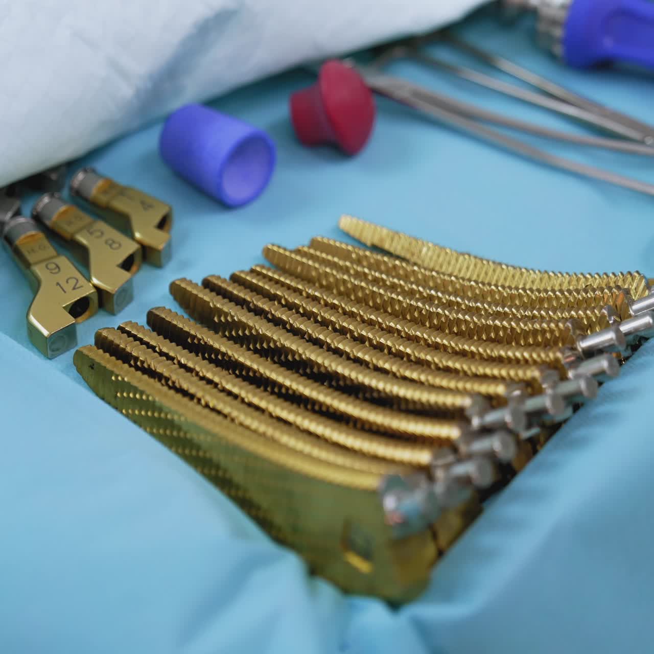 Medical instruments in operating room. Set of surgical tools on blurred table background in hospital. Close-up