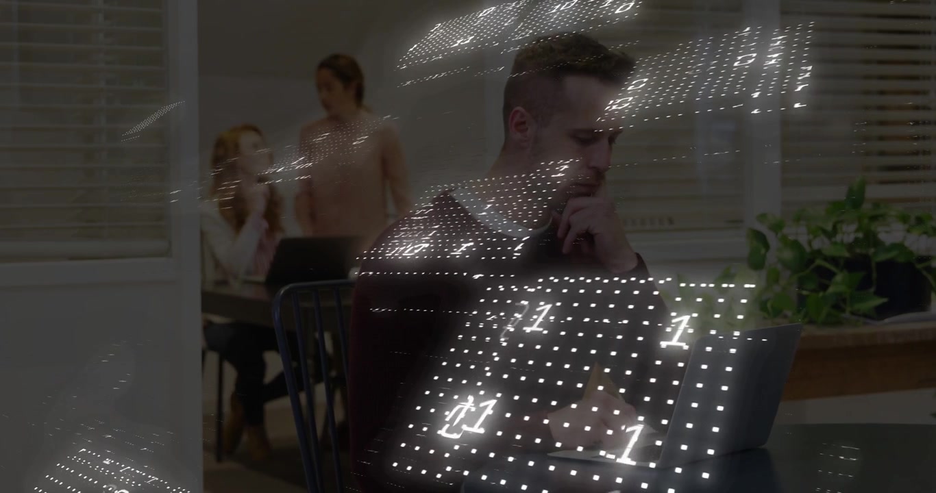Man typing and pausing from binary dotted-grid overlay sweeping over laptops, women consulting tech