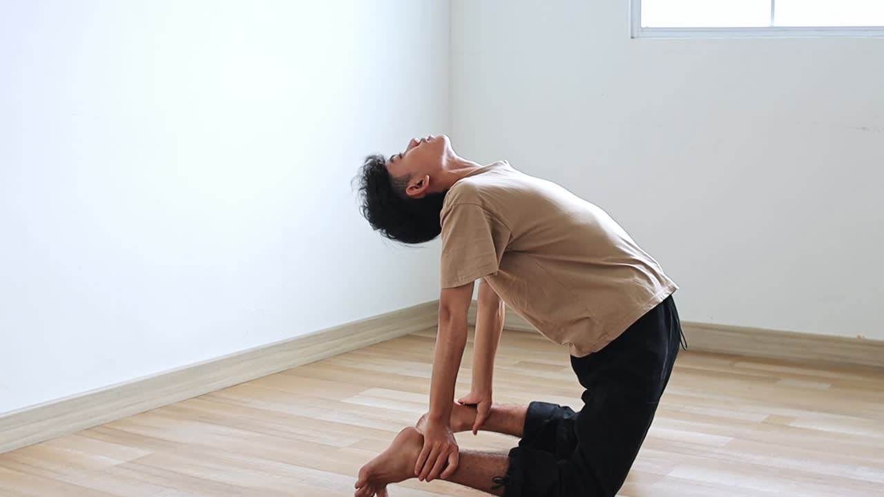 Man doing yoga poses