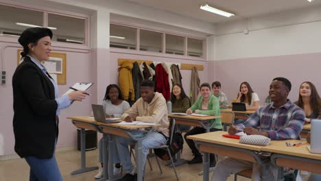 students in a classroom with their teacher