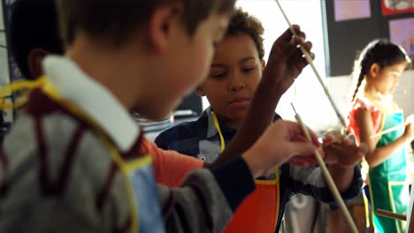 attentive schoolkids panting on canvas