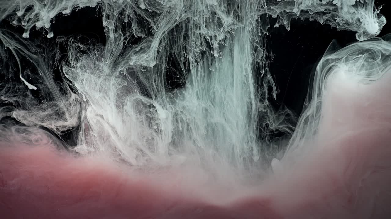 Paints. Abstract forms. Shooting on a black background