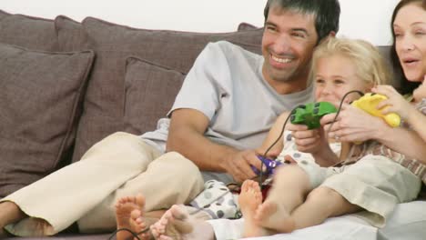 happy family playing a video game