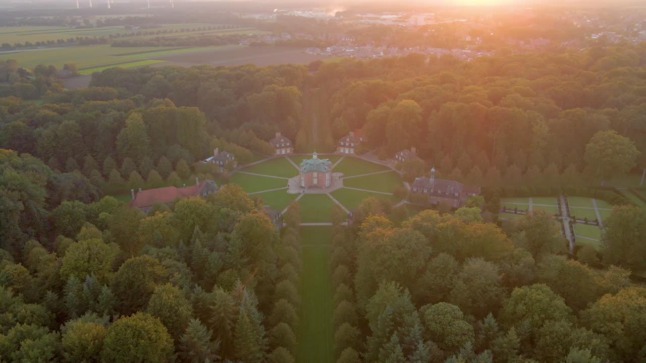 Scenic View Of Hunting Complex Lodges And Clemenswerth Palace On Sunset In Sogel, Germany. Aerial