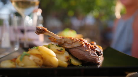 potatoes and duck confit close up shot