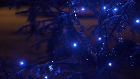 new year's tree decorated with blue lights