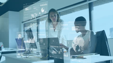 collaborating on digital data analytics, business professionals in modern office setting