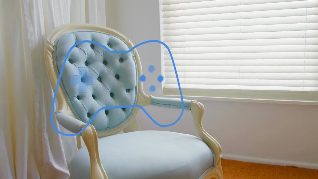 Animation of gamepad icon over armchair
