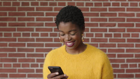 portrait of attractive stylish black woman using smarphone smiling enjoying texting browsing social media