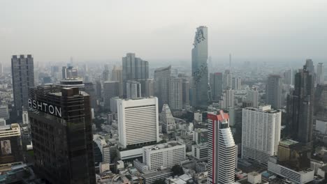 4k aerial drone video cityscape of downtown bangkok thailand with ashton condo and mahanakhon tower