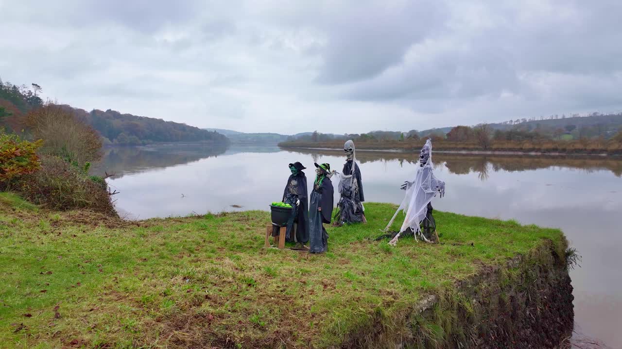 Scary gathering of witches on riverbank of the River Suir Waterford Ireland