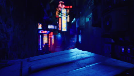 a dark alleyway in a city at night, illuminated by colorful neon signs