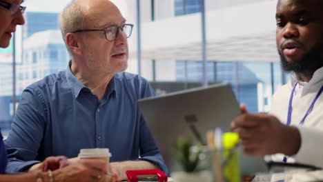 elderly couple consulting with a financial advisor to create a retirement plan