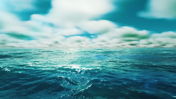 Una scena mozzafiato del mare azzurro che si fonde perfettamente con un cielo mozzafiato adornato da nuvole soffici e gonfie