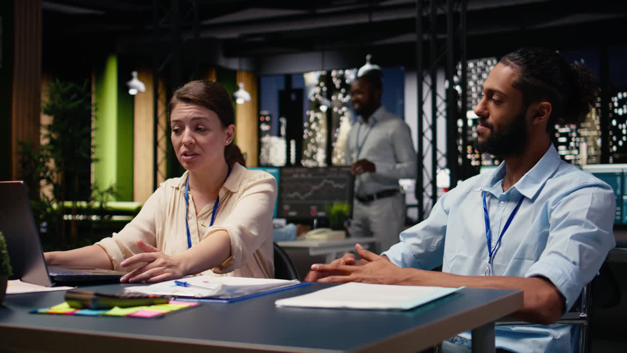Man with reduced mobility in wheelchair and woman colleague collaborating