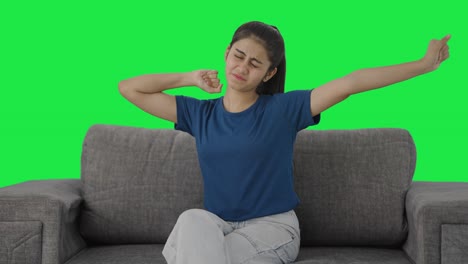 Tired-Indian-teenage-girl-feeling-sleepy-Green-screen